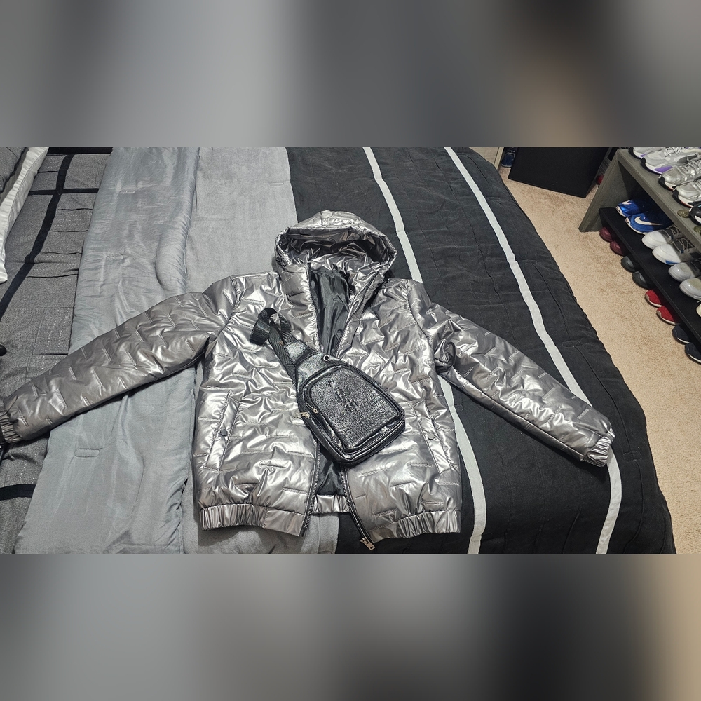 Shiny Silver Puffer Jacket with Black Bag